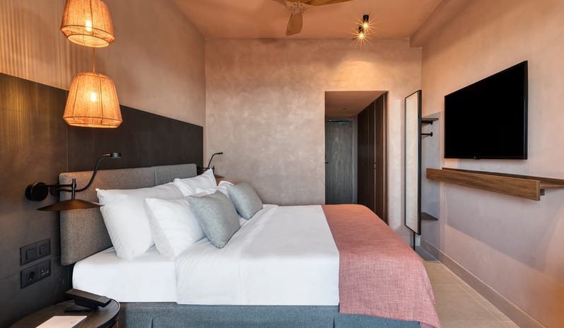 Inland Family Suite Bedroom with Mediterranean Decor at Domes of Corfu by Kenwood Travel