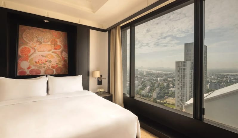 bedroom at Skyline City View hotel in thailand by Kenwood Travel