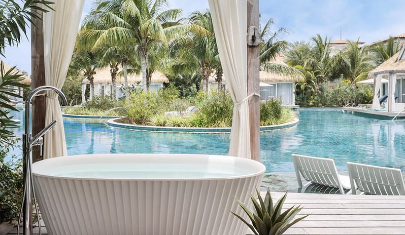 Bathtub with pool View at Sandals Royal Curacao hotel in Caribbean by Kenwood Travel
