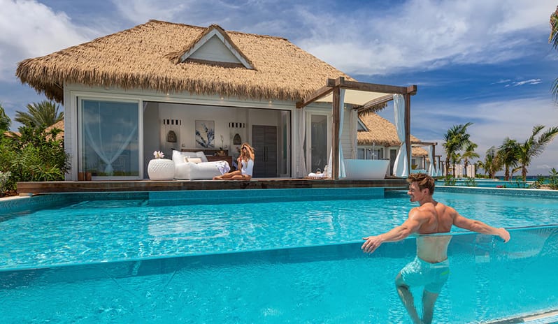 Pool With Resort Front View at Sandals Royal Curacao hotel in Caribbean by Kenwood Travel