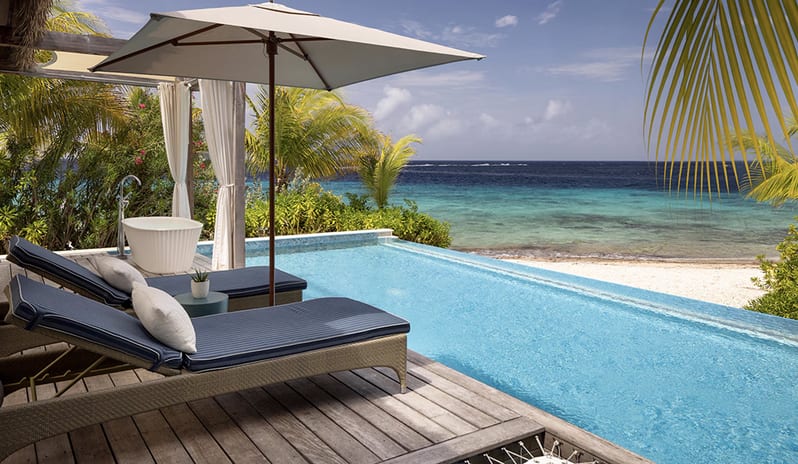 Pool with sea sore View at Sandals Royal Curacao hotel in Caribbean by Kenwood Travel