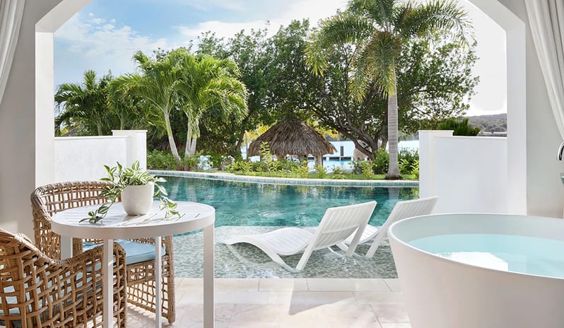 Bathtub With Pool View at Sandals Royal Curacao hotel in Caribbean by Kenwood Travel