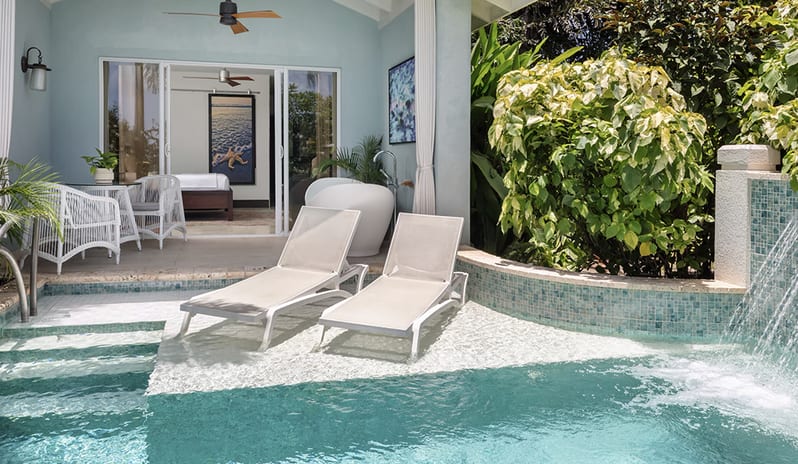 Pool with Patio Tranquility Soaking Tub at Sandals Royal Curacao hotel in Caribbean by Kenwood Travel