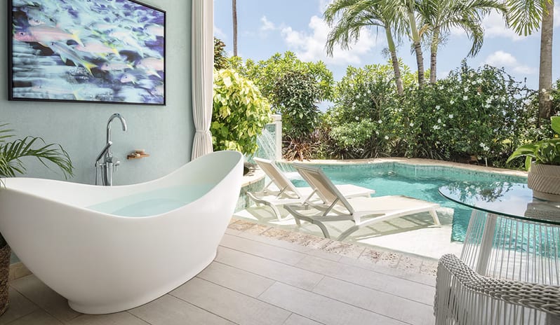 Pool with Patio Tranquility Soaking Tub at Sandals Royal Curacao hotel in Caribbean by Kenwood Travel