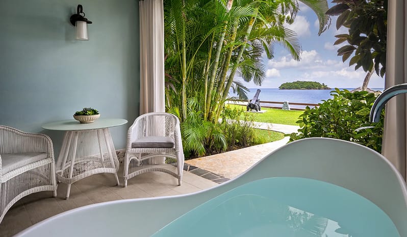 Patio Tranquillity Soaking Tub Bedroom at Sandals Royal Curacao hotel in Caribbean by Kenwood Travel