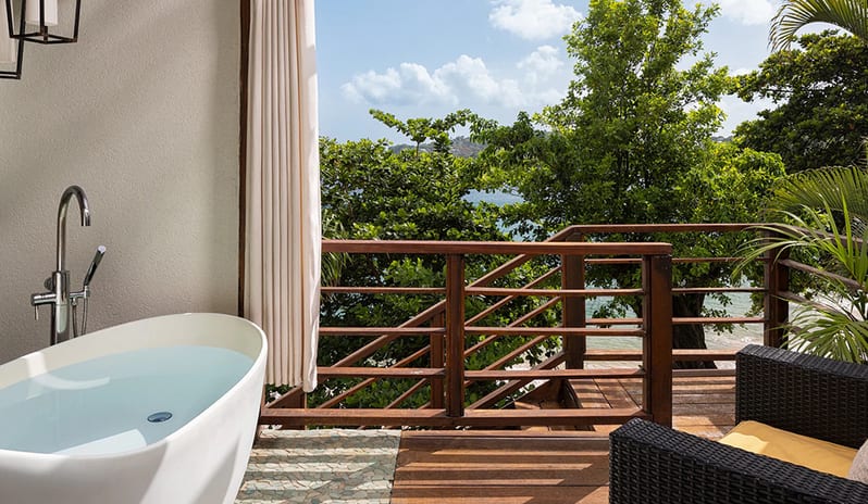 Balcony Tranquility Soaking Tub at Sandals Regency La Toc hotel in Caribbean by Kenwood Travel
