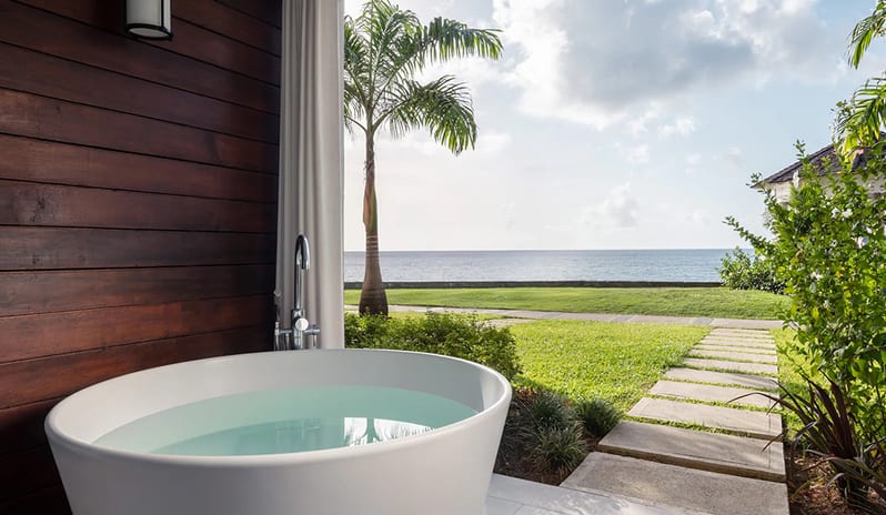 Patio Tranquility Soaking Tub at Sandals Regency La Toc hotel in Caribbean by Kenwood Travel