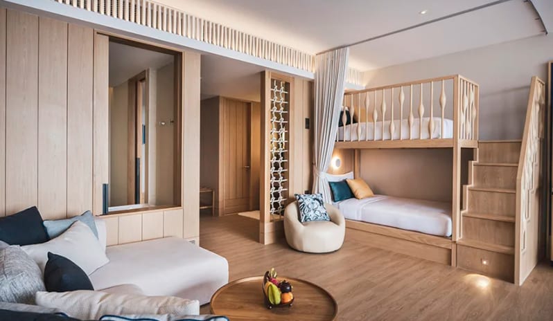 Family Pool View Suite Close-up of integrated wooden bunk beds with a safety staircase in the Family Pool View at Anantara Koh Yao Yai Resort & Villas by Kenwood Travel