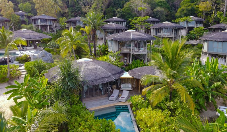 Aerial View of Luxury Beachfront Treehouse Villas with Thatched Roofs at TreeHouse Villas Koh Yao by Kenwood Travel