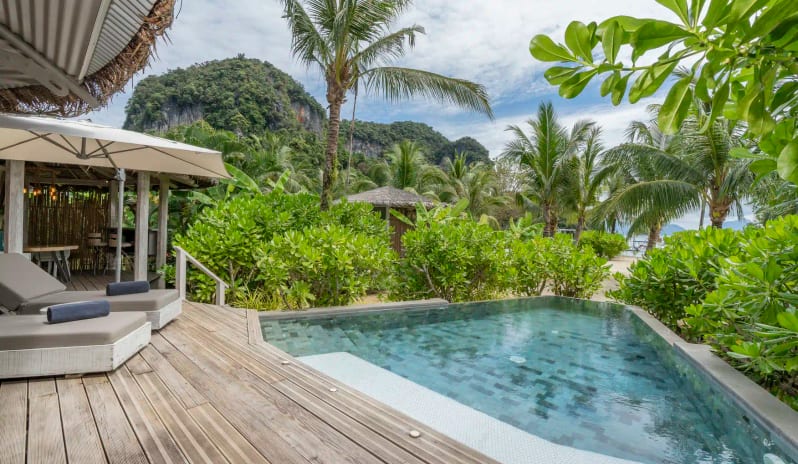 Luxury Beachfront Pool Villa with Private Swimming Pool, Wooden Deck, Palm Trees, and Tropical Ocean View at TreeHouse Villas Koh Yao by Kenwood Travel