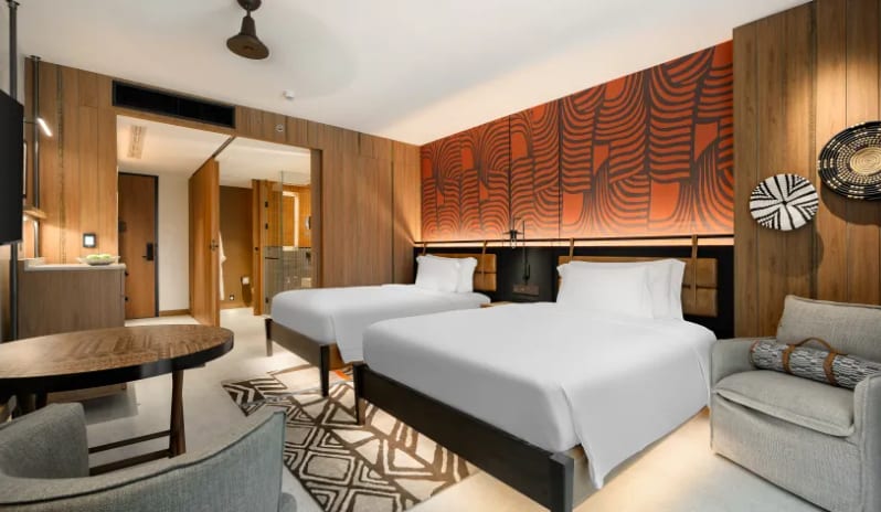 Premium Explorer (DBL/DBL) two twin beds, designer lighting, and contemporary wooden interiors at Centara Grand Mirage Beah Resort by Kenwood Travel