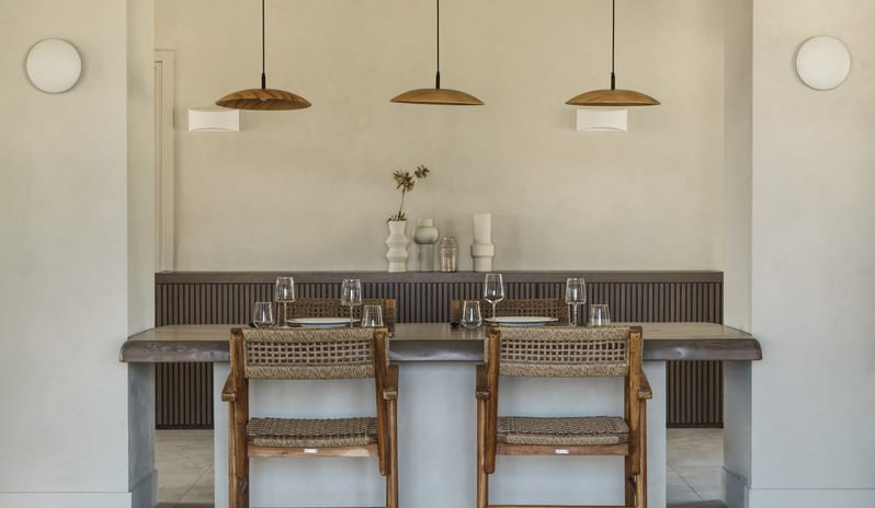 Meze Restaurant interior, modern Mediterranean decor, minimalist restaurant design. at Aulūs Lindos Rhodes, Curio Collection by Hilton by Kenwood Travel
