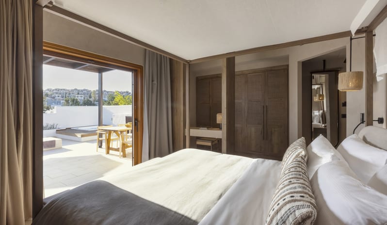 Tropical Bungalow Open Plan Suite with Outdor Jacuzzi Bedroom at Aulūs Lindos Rhodes, Curio Collection by Hilton by Kenwood Travel