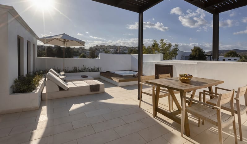 Tropical Bungalow Open Plan Suite with Outdor Jacuzzi Sun Loungers Under a Clear Blue Sky at Aulūs Lindos Rhodes, Curio Collection by Hilton by Kenwood Travel
