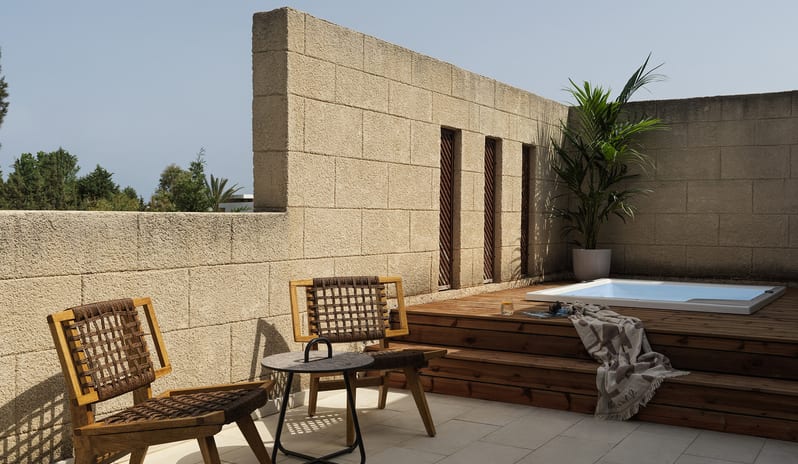 Tropical Pavilion Two Bedroom Suite with Outdoor Jacuzzi featuring private outdoor jacuzzis and seamless indoor-outdoor living at Aulūs Lindos Rhodes, Curio Collection by Hilton by Kenwood Travel