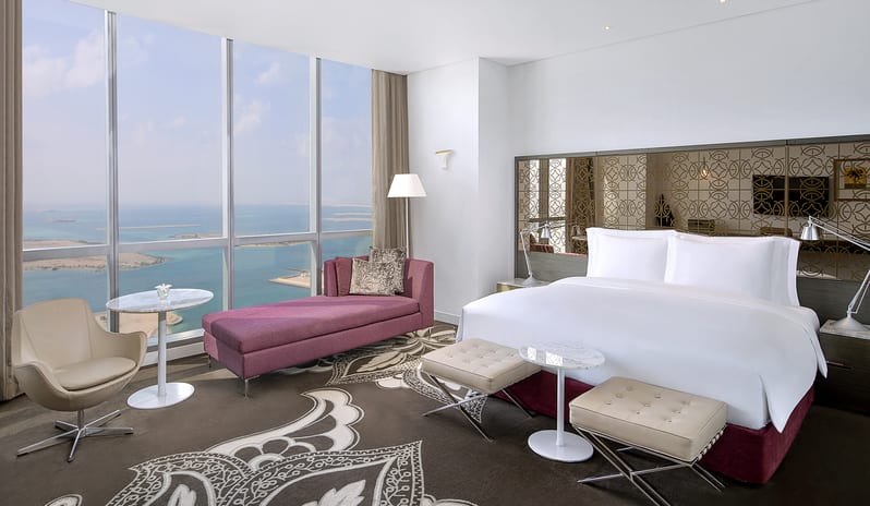 Grand Premier Room with Sea View Bedroom with Panoramic Sea View at Conrad Abu Dhabi Etihad Towers by Kenwood Travel