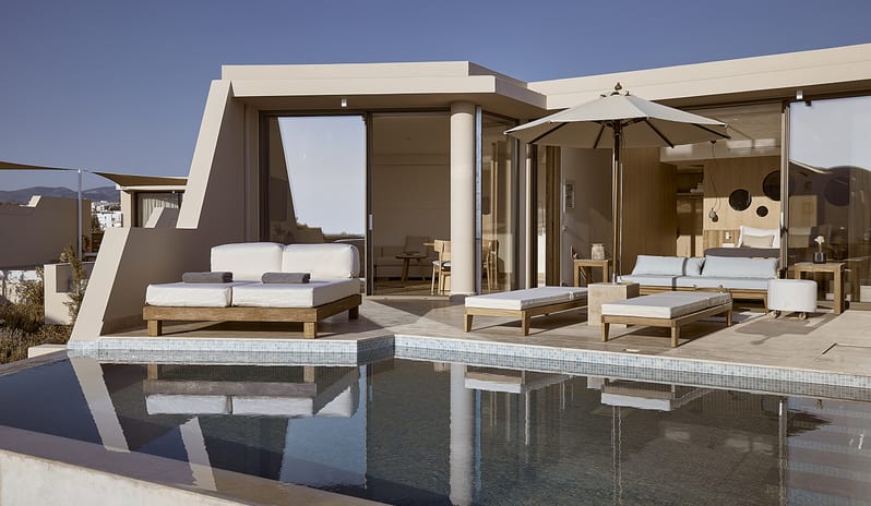 Olives & Sea 3-Bedroom Villa Private Pool Harbour View/Sea View private infinity pool, sun loungers, and modern Mediterranean architecture under a clear blue sky at St.Nicolas Bay Resort by Kenwood Travel