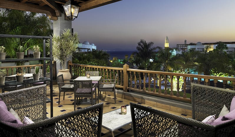 Sophisticated evening lounge area with comfortable seating and warm ambient lighting at Princesa Yaiza Suite Hotel Resort in Europe Holidays by Kenwood Travel