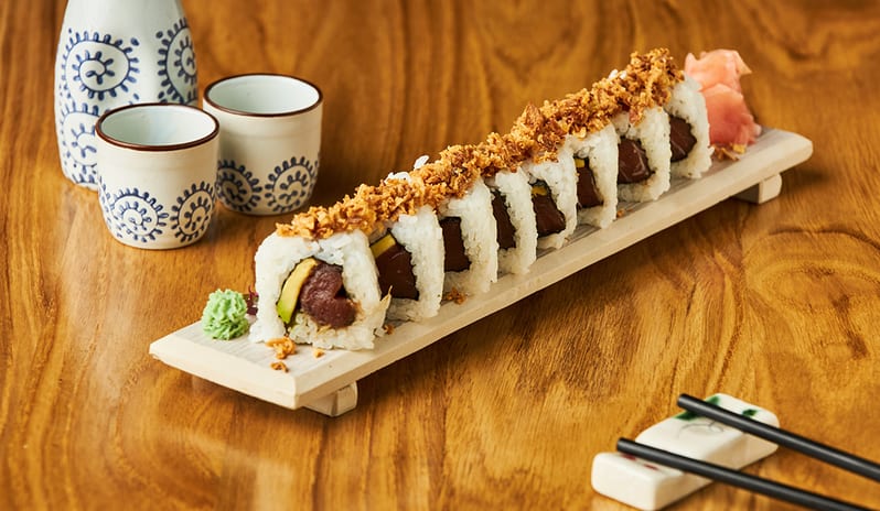 Tuna and avocado sushi roll topped with crispy onions, served with a sake set at Princesa Yaiza Suite Hotel Resort in Europe Holidays by Kenwood Travel