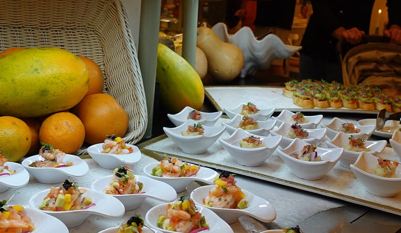 Individual servings of gourmet shrimp and mango appetizers at the La Piazzetta buffet at Princesa Yaiza Suite Hotel Resort in Europe Holidays by Kenwood Travel