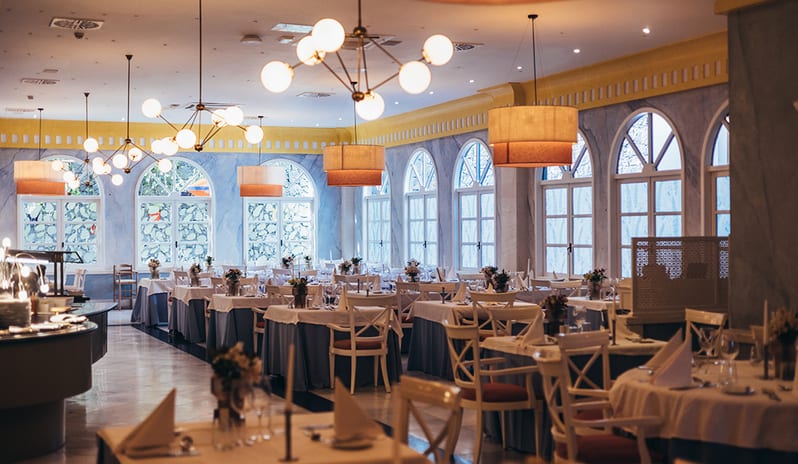 Entrance area of the Yaiza Buffet restaurant featuring dark wood pillars at Princesa Yaiza Suite Hotel Resort in Europe Holidays by Kenwood Travel