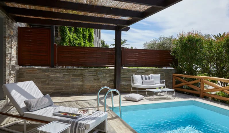 Suite Private Pool Nero private pool view, contemporary living area, and separate bedroom at Eagles Palace by Kenwood Travel