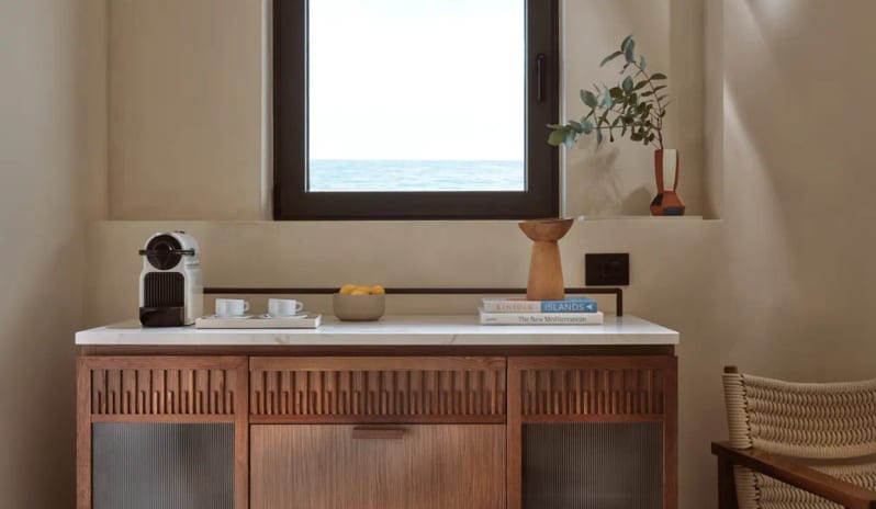 Panorama Suite Sea Front wooden coffee station with a marble top and fluted at Eagles Palace by Kenwood Travel