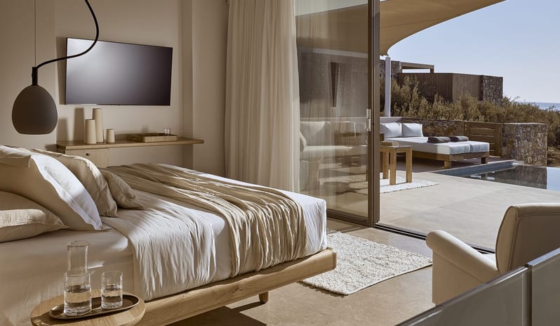 Olives & Sea Two Bedroom Suite Private Pool Harbour View/Sea View bedroom of the 2-bedroom suite at Olives & Sea with direct access to the private pool and outdoor living area at St.Nicolas Bay Resort by Kenwood Travel