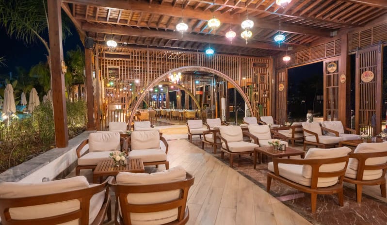 Balbura Snack Bar wooden architecture and decorative Turkish lanterns at night at Liberty Fabay by Kenwood Travel