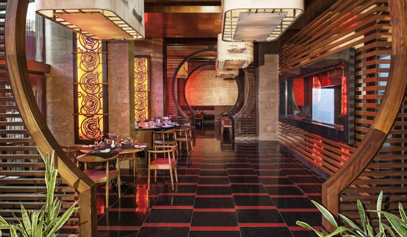 Tao Far East & Teppanyaki circular wooden archways, decorative boat lanterns, and modern Asian-inspired decorat Hilton Dalaman Sarigerme Resort & Golf by Kenwood Travel
