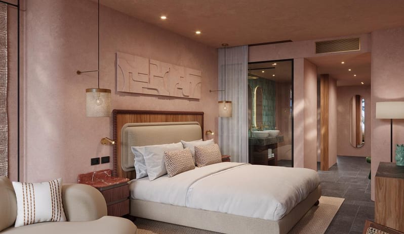 Suite Deluxe Sea View Terrace featuring Mediterranean-inspired terracotta walls, a king bed, and luxury contemporary decor at Costa Ragusa Borgo & Resort by Kenwood Travel