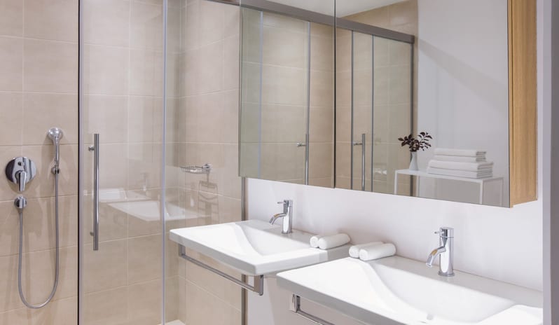 Family Guestroom Inland View Luxury double vanity bathroom in a family guestroom at Grecotel LUXME Dama Dama by Kenwood Travel