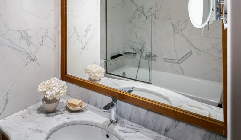 Grand Family Apartment Inland View Modern marble bathroom at Grecotel LUXME Dama Dama by Kenwood Travel