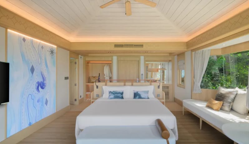 Villa Ocean ViewLuxury resort villa bedroom interior showing king bed and blue accent mural at Centara Villas Phi Phi Island by Kenwood Travel
