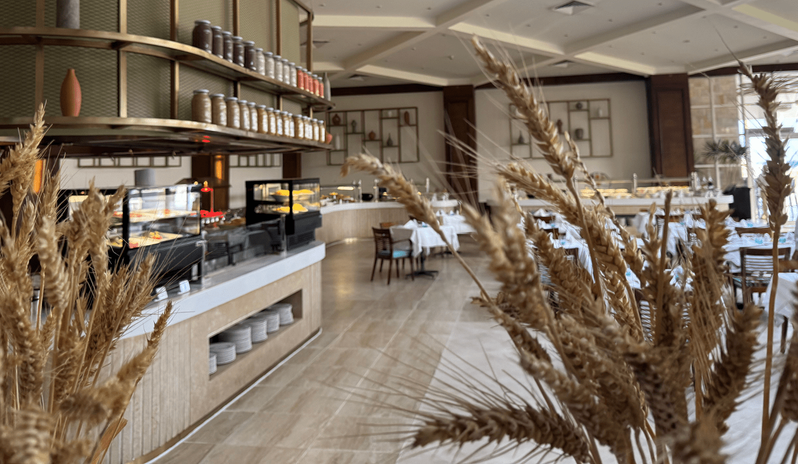 Sinai Restaurant modern buffet station and beautifully set guest tablesat Baron Resort Sharm El Sheikh  by Kenwood Travel