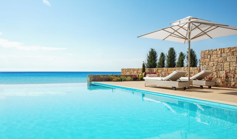 Two Bedroom Bungalow Suite Private Pool Front Sea View Luxury beachfront resort infinity pool and sun deck with a wide ocean horizon view at Sani Club by Kenwood Travel