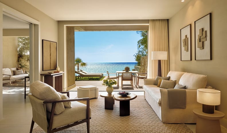 Two Bedroom Bungalow Suite Private Pool Front Sea View Elegant boutique hotel sitting room opening up to a private patio overlooking the sea at Sani Club by Kenwood Travel