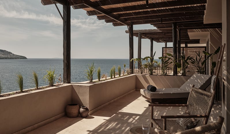 Junior Suite wooden pergola, luxury sun loungers, woven armchairs, and panoramic Aegean Sea views at OKU Bodrum by Kenwood Travel