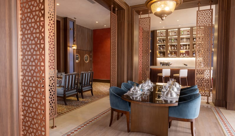 Lalezar Upscale traditional dining table setup and bar interior at Rixos Radamis Sharm El Sheikh by Kenwood Travel