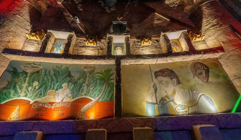 Caligula Hot Rock Themed interior wall featuring classical Roman frescoes, portrait busts in niches, and dramatic architectural lighting at Savoy Sharm El Sheikh by Kenwood Travel