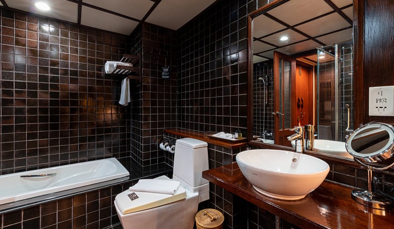 Siam Chaletat luxury bathroom interior with tub and vanity at Khaolak Laguna Resort by Kenwood Travel