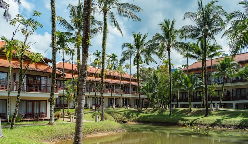 Siam Chaletat building exterior and tropical resort grounds at Khaolak Laguna Resort by Kenwood Travel