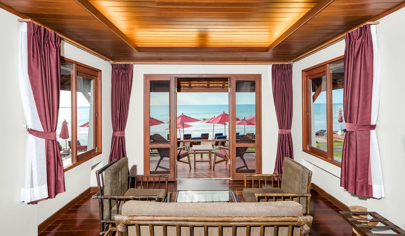 Similan Pearl living room with direct beach and ocean views at Khaolak Laguna Resort by Kenwood Travel
