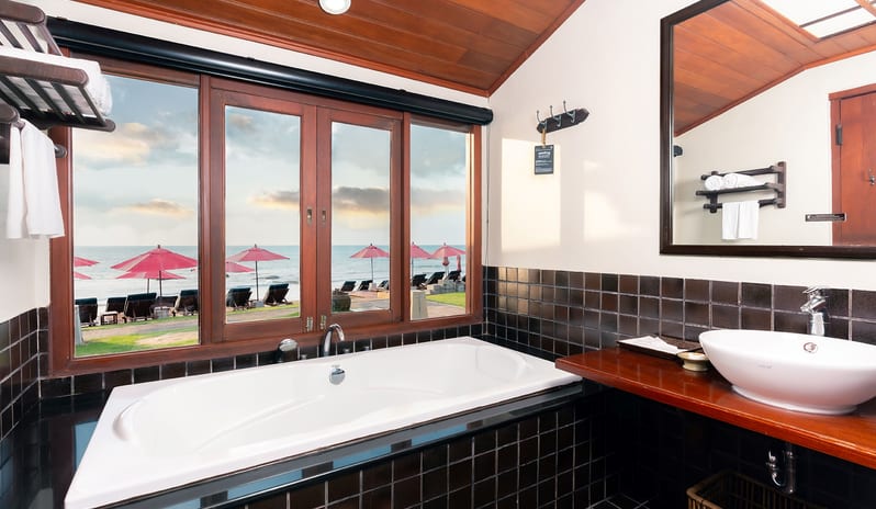 Similan Pearl bathroom with bathtub and vessel sink vanity at Khaolak Laguna Resort by Kenwood Travel