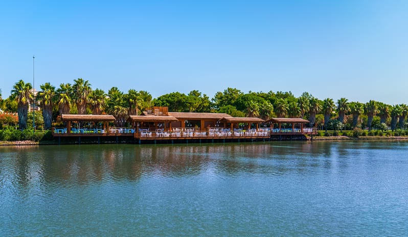 River Landing A La Carte Restaurant outdoor restaurant and scenic waterfront lounge area at Gloria Serenity Resort by Kenwood Travel