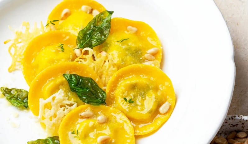 Spezia Artisanal ravioli pasta dish with basil and pine nuts served at an upscale restaurant at Impression Isla Mujeres by Secrets by Kenwood Travel