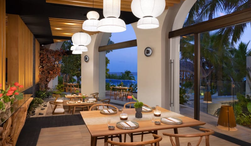 Sake dining room with distinctive lantern lighting and panoramic ocean views at Impression Isla Mujeres by Secrets by Kenwood Travel