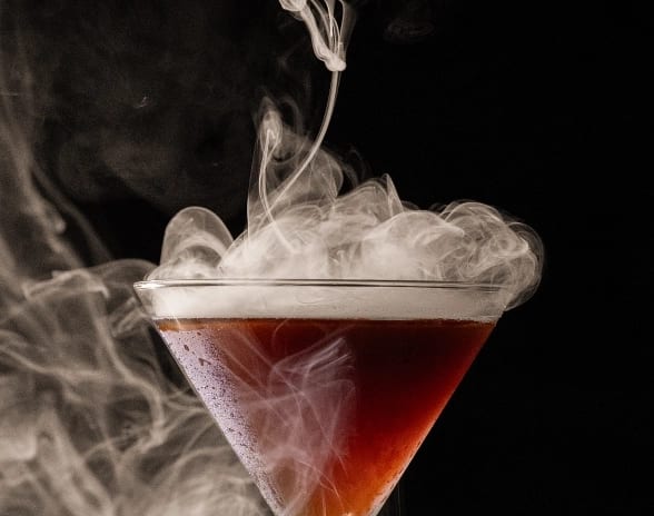 Fuego Smoky signature martini cocktail at Moon Palace The Grand Punta Cana by Kenwood Travel