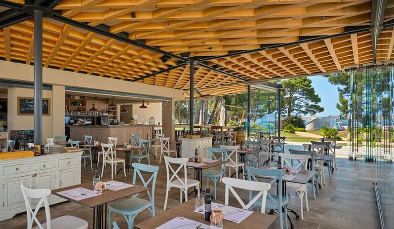 Fogo by Bekal Interior dining room with wooden ceiling structure at Pical Resort, Valamar Collection by Kenwood Travel