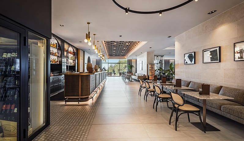 Mozaik Bar Sleek bar counter and indoor seating area at Pical Resort, Valamar Collection by Kenwood Travel